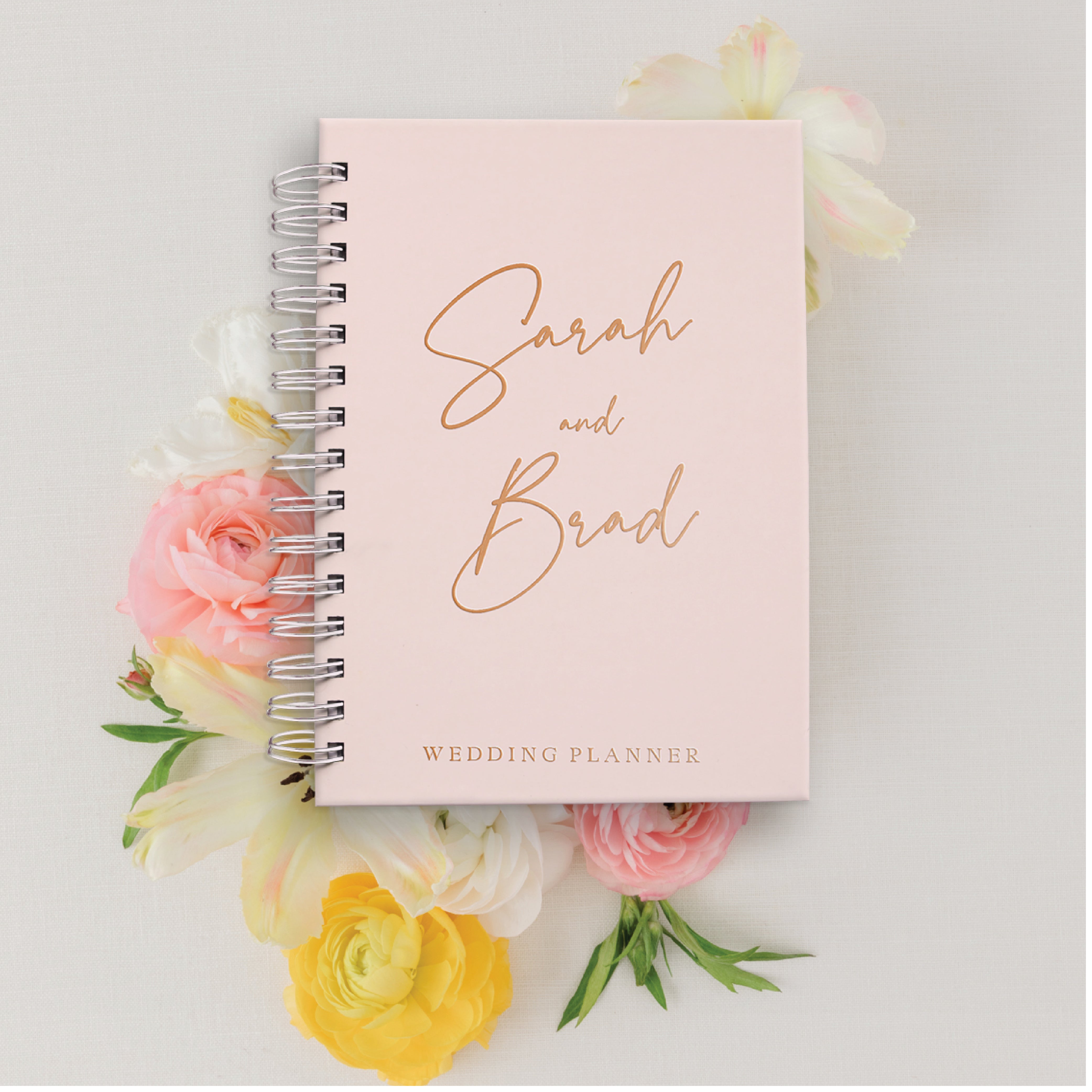 Get ready to plan your dream wedding with our Modern Wedding Planner. This modern planner is designed specifically for the bride-to-be, making wedding planning a fun and stress-free experience. Stay organized and on top of every detail for your special day.